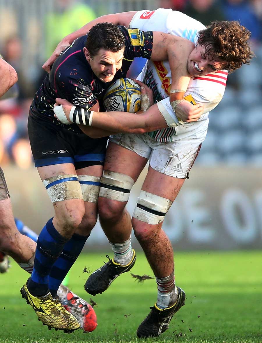 Worcester's Phil Dowson is tackled by Charlie Matthews