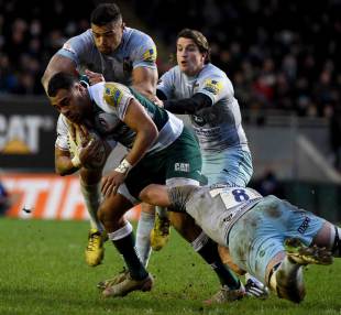 Telusa Veainu of Leicester Tigers is tackled by Sam Dickinson of Northampton during the Aviva Premiership match between Leicester Tigers and Northampton Saints at Welford Road on January 9, 2016 in Leicester, England. (Photo by Ross Kinnaird/Getty Images)