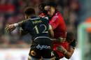 Toulon's Ma'a Nonu takes the ball into contact with Bath's Kyle Eastmond