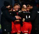 Owen Farrell is congratulated by his Saracens team-mates