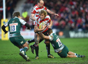 GLOUCESTER, ENGLAND - JANUARY 30: Billy Twelvetrees of Gloucester Rugby is tackled by Peter Betham of Leicester Tigers during the Aviva Premiership match between Gloucester Rugby and Leicester Tigers at Kingsholm Stadium on January 30, 2016 in Gloucester, England. (Photo by Tom Dulat/Getty Images)