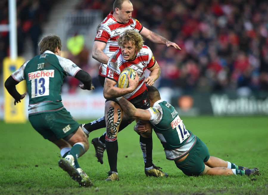 Gloucester's Billy Twelvetrees is tackled by Tigers' Peter Betham