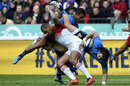 Italy's centre Michele Campagnaro is tackled by France's centre Gael Fickou 