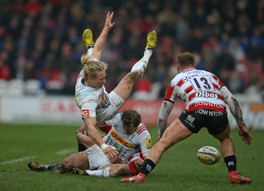 Matt Hopper and Nick Evans of Harlequins lose the ball as they collide