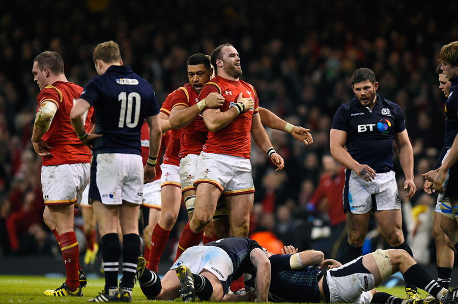 Jamie Roberts celebrates his second-half try, along with teammate Taulupe Faletau