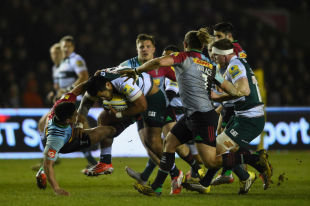 Manu Tuilagi of Leicester charges into Ben Botica of Harlequins during the Aviva Premiership match between Harlequins and Leicester Tigers at (Photo by Mike Hewitt/Getty Images)
