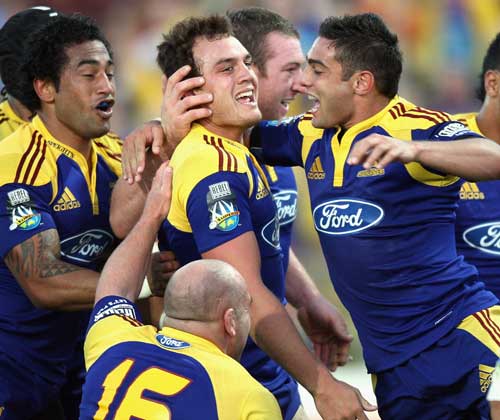 The Highlanders' Isreal Dagg is congratulated after scoring a try
