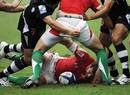 Wales' Ifan Evans attempts to protect the ball