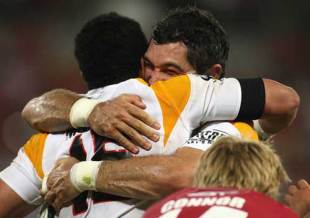 The Chiefs' Mils Muliaina is congratulated by team mate Stephen Donald, Reds v Chiefs, Super 14, Suncorp Stadium, Brisbane, Australia, March 28, 2009