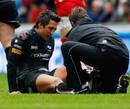 The Ospreys' Gavin Henson receives treatment after suffering an injury