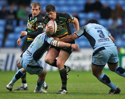 Northampton's James Downey looks to force an opening in the Blues' defence