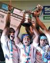 Fiji celebrate with the Hong Kong 7s trophy after their victory over South Africa