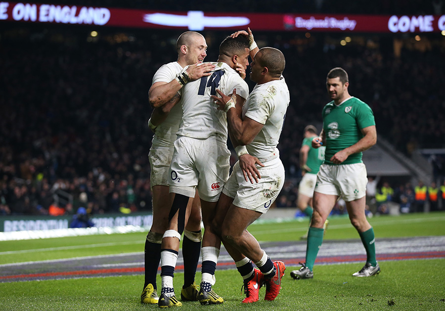 Anthony Watson is congratulated on his try that put England ahead in the second half