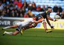 Wasps' Nathan Hughes is tackled by Luke Wallace