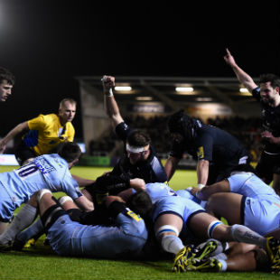 Falcons players celebrate forward Rob Vickers (hidden) try during the Aviva Premiership match between Newcastle Falcons and Worcester Warriors at Kingston Park on March 4, 2016 in Newcastle upon Tyne, England. (Photo by Stu Forster/Getty Images)