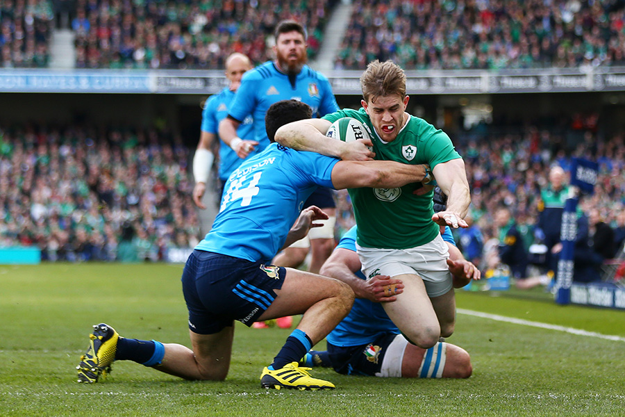 Andrew Trimble of Ireland dives to score their first try 