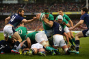CJ Stander of Ireland dives over a maul to score his team's opening try