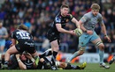 Will Chudley of Exeter Chiefs looks to offload the ball 