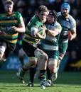 Northampton's Teimana Harrison breaks with the ball against Leicester