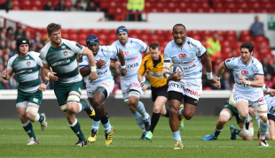 Joe Rokocoko of Racing Metro 92 (6th L) powers through the defence during the European Champions Cup semi-final rugby union match between Leicester Tigers and Racing 92 at The City Ground in Nottinghamshire, central England, on April 24, 2016.