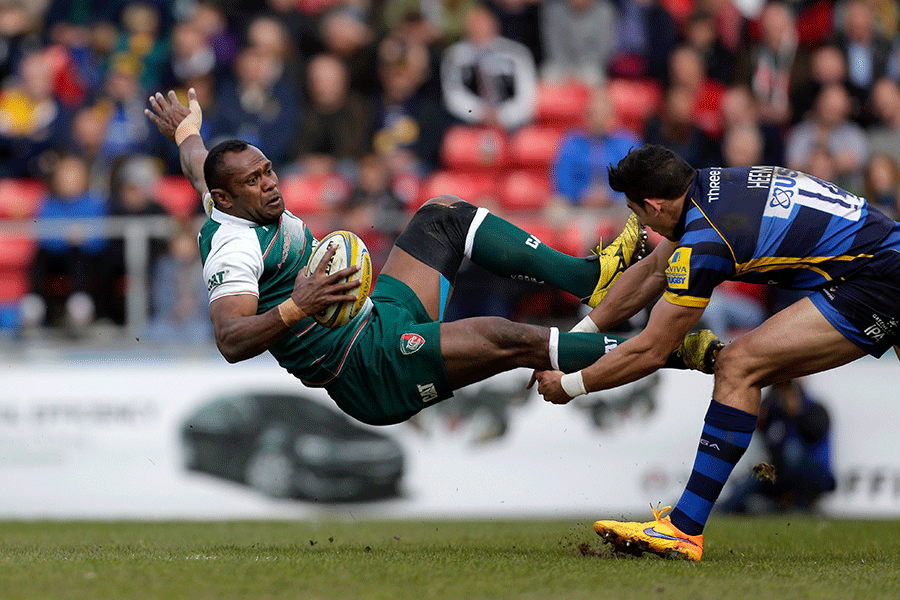 Vereniki Goneva of Leicester Tigers is tackled by Bryce Heem of Worcester Warriors