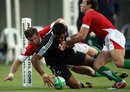 Julian Savea of New Zealand dives over to score a try during day one of the IRB Adelaide International Rugby Sevens match between New Zealand and Wales