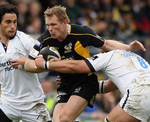 Wasps centre Josh Lewsey crashes in to the Newcastle defence
