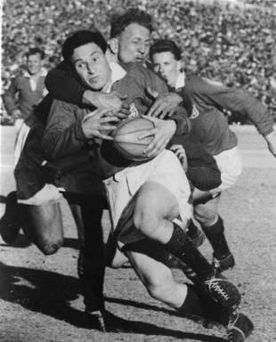 British and Irish Lions fly-half Cliff Morgan is tackled, South Africa v British and Irish Lions, First Test, Ellis Park, Johannesburg, August 6, 1955