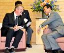 IRB chairman Bernard Lapasset shares a laugh with Japanese Prime Minister Taro Aso 