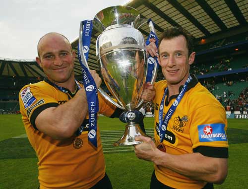 Alex King and Rob Howley lift the Premiership trophy