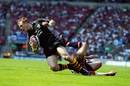 Josh Lewsey is tap tackled