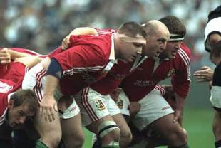 The British and Irish Lions front row of Dai Young, Keith Wood and Tom Smith prepares to scrum down during the tour match against Natal Sharks, the Lions won the match 42-14. Natal Sharks v British and Irish Lions, Tour Match, Kings Park, June 14 1997.