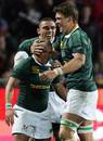 Ricky Januarie is congratulated after scoring against New Zealand