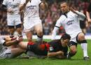 Saracens' Brad Barritt dives over to score a try