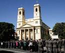 Mourners pack the street outside  Mary Immaculate Church in Sydney's eastern suburbs