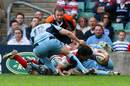 Gloucester's Mark Foster forces his way over for a try