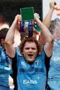 Cardiff Blues captain Paul Tito lifts the Anglo-Welsh Cup trophy