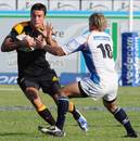 The Chiefs' Richard Kahui is tackled by the Cheetahs' Jacques-Louis Potgieter
