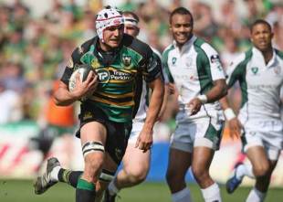 Northampton's Juandre Kruger races through to score a try during the Guinness Premiership match between Northampton Saints and London Irish at Franklins Gardens on April 18, 2009 in Northampton, England