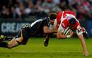 Gloucester's Adam Eustace is tackled by Worcester's Pat Sanderson
