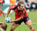 Munster scrum-half Tomas O'Leary passes the ball