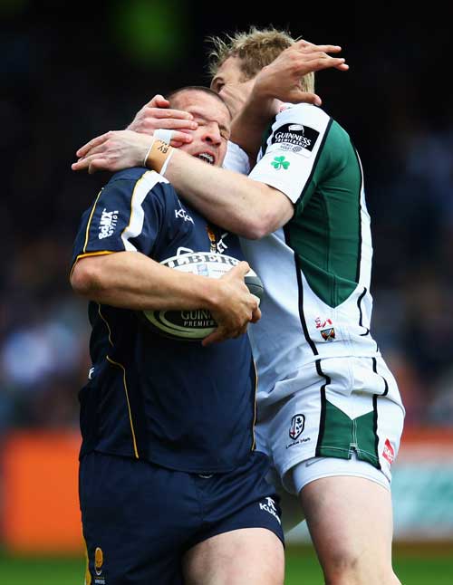 Worcester's Chris Fortey is tackled by London Irish's Peter Hewat