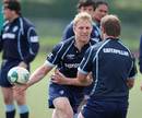 Leicester flanker Lewis Moody passes the ball during training