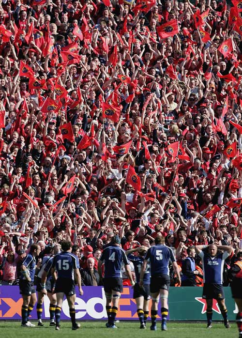 Munster fans celebrate a try for their side against Leinster