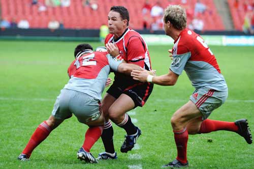 Andre Pretorius is tackled by Crusaders centre Ryan Cross