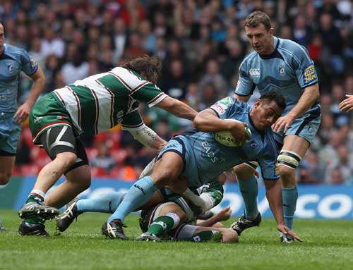 Cardiff Blues' Tauf'au Filise is felled by the Leicester defence