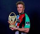 Harlequins' Chris Robshaw poses with the 2008-09 Guinness Premiership Player of the Year award
