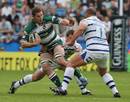 Leicester's Craig Newby fends off the Bath defence