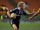 The Stormers' Joe Pietersen fends off the Western Force defence