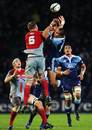 The Blues' Rudi Wulf and the Crusaders' Kieran Read compete for a high ball